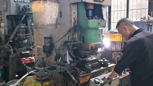 Slick-Worker-Punching-Hardware-Parts