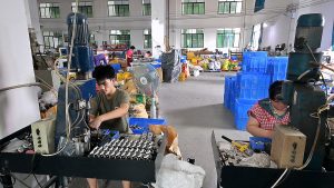 Slick-Workers-Processing-Hardware-Parts