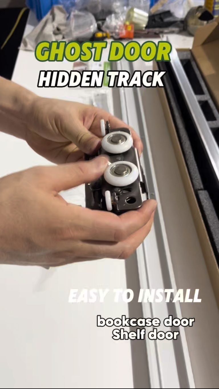 Open the package, and here it is: the ghost door hidden track system. This unboxing takes you through what arrives — the track, the hangers and the fittings, all packed for a clean install. Holding the parts, you can feel the finish and the weight; this is hardware you can trust on site. We are a door hardware manufacturer, and this system is available for OEM. Want to see more of what we make? Please consult us — we are happy to help.